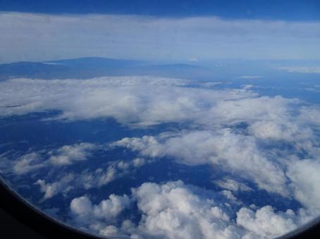 飛行機から見た空 飛行機,青空,雲の写真素材