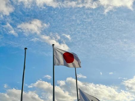 掲揚された国旗と空模様 国旗,旗,掲揚の写真素材