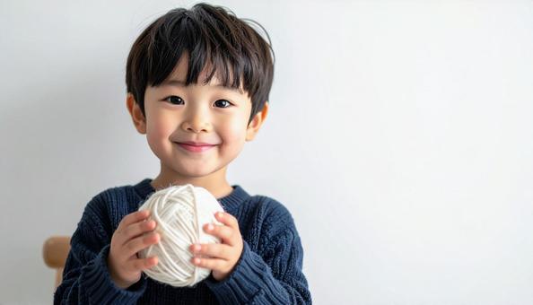 毛糸玉と子供 毛糸玉と子供の写真