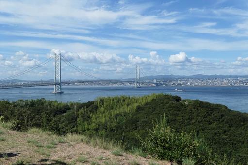 明石海峡大橋と兵庫のまち 瀬戸内海,空,晴れの写真素材