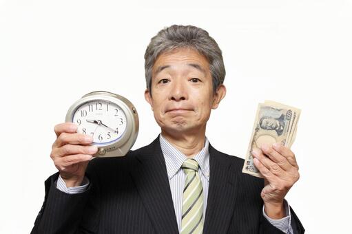 シニア　男性　サラリーマン　時は金なり シニア,シニア男性,サラリーマンの写真素材