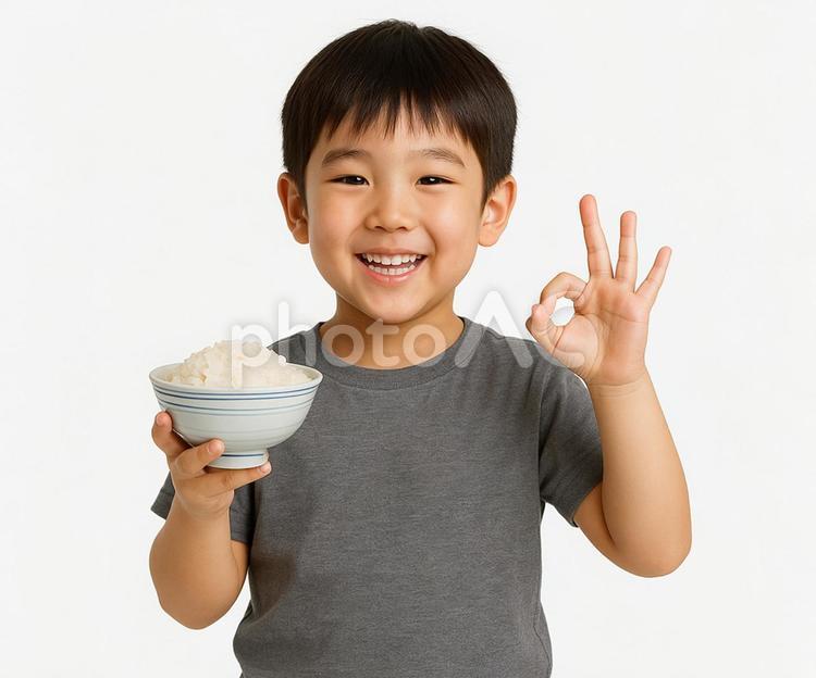 白米の入った茶碗とオッケーポーズの男の子 ごはん,白米,お米の写真素材