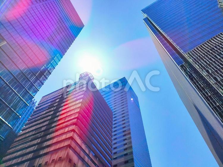 東京のビル街と青空と日差し 東京,ビル街,青空の写真素材