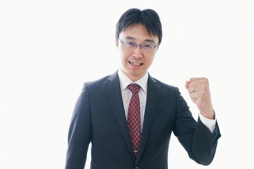 ガッツポーズをするビジネスマン ガッツポーズをするビジネスマン 喜ぶ,コンサルティング,会議の写真素材