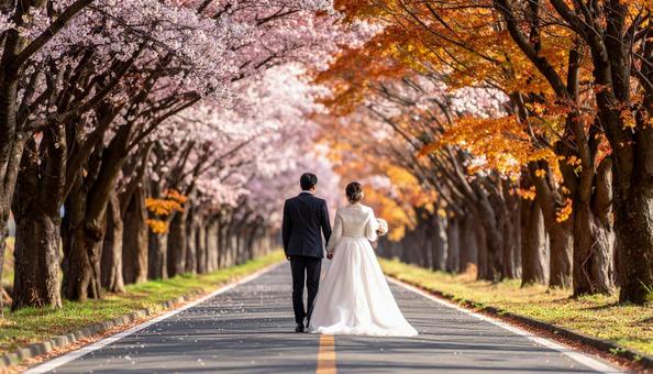 花道を歩く新郎新婦 花道を歩く新郎新婦の写真