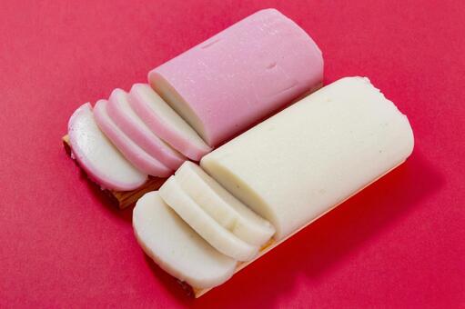 赤背景の紅白かまぼこ かまぼこ,おせち料理,和食の写真素材