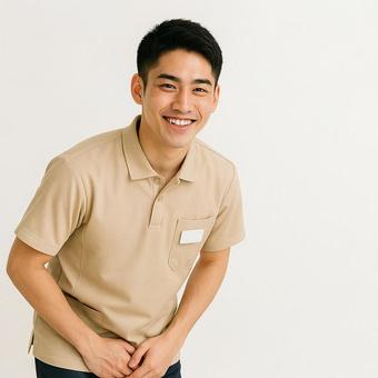 お辞儀をする介護士 お辞儀をする介護士の写真