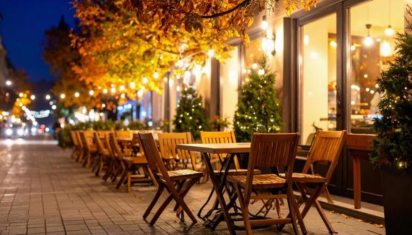 ライトアップされた紅葉のカフェテラスの写真