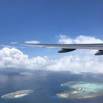 飛行機から見える空 飛行機,空,雲の写真素材
