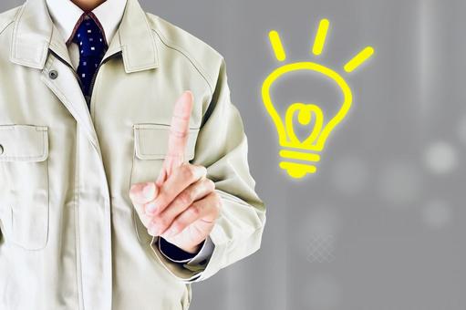  問題を解決する作業服を着た男性と電球 解決,アイディア,作業員の写真素材