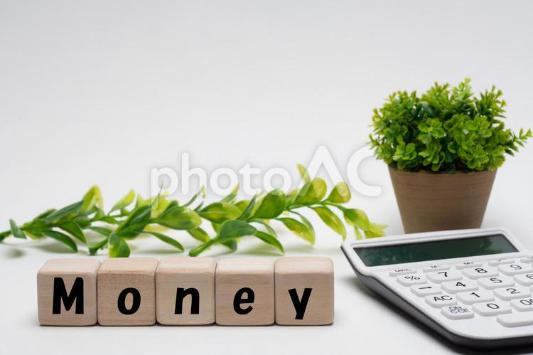 電卓とmoneyの文字 money,お金,貯金の写真素材