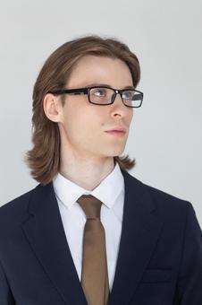 メガネとスーツを身に着けた男性 男性,外国人,欧米人の写真素材