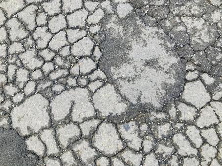 アスファルトの亀裂テクスチャー アスファルトの亀裂テクスチャーの写真