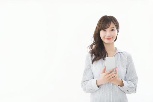 若い女性 スマートフォン 若い女性 スマートフォンの写真