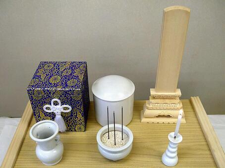 From the ashes displayed on the white wooden desk, bone pots, urn, bardo dais, JPG