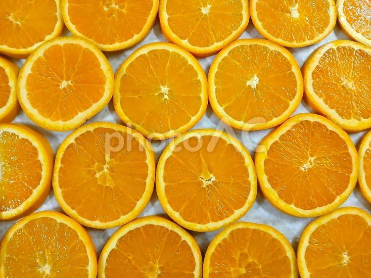 オレンジの輪切り　交差並列 オレンジ,アロマ,果物の写真素材