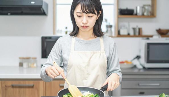 料理をしたくない女性 料理をしたくない女性の写真