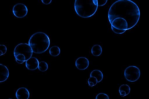 Blue fluffy soap bubbles on a black background Blue fluffy soap bubbles on a black background