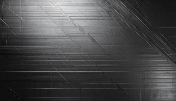 キズのあるブラックメタリックな金属 キズのあるブラックメタリックな金属の写真