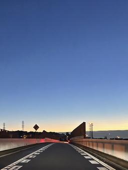夜明けの道 道路,空,自然の写真素材