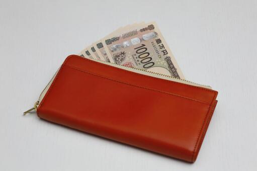 茶色い財布と1万円札 財布,長財布,5万円の写真素材