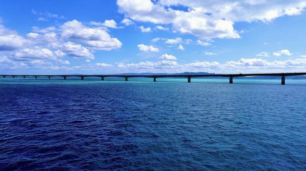 Kouri Bridge and the sky seen from the sea, JPG