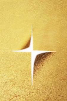 十字にカットした金紙1の写真