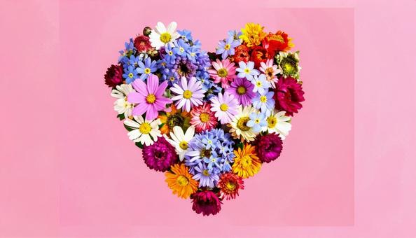 花のピンク入りのディスプレー、ハート型の写真