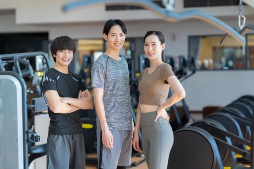 スポーツジムでトレーニングをする若い男女 スポーツジム,フィットネス,ダイエットの写真素材