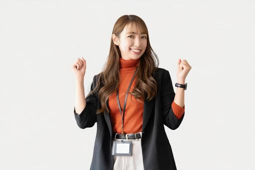 ガッツポーズをする女性・ビジネスウーマン ガッツポーズをする女性・ビジネスウーマン 女性,ガッツポーズ,笑顔の写真素材