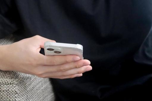 スマホを持つ男性の手 スマホを持つ男性の手 スマホ,男性,ビジネスの写真素材