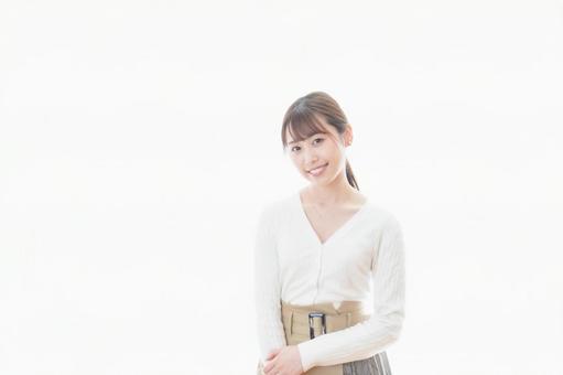 笑顔の若い女性 笑顔の若い女性 副業,白バック,格好の写真素材