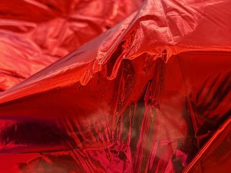 赤いホイルのシワ テクスチャ,シワ,しわくちゃの写真素材