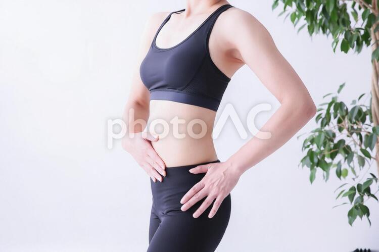 スポーツウェアの美しい女性 ダイエット,お腹,ボディの写真素材