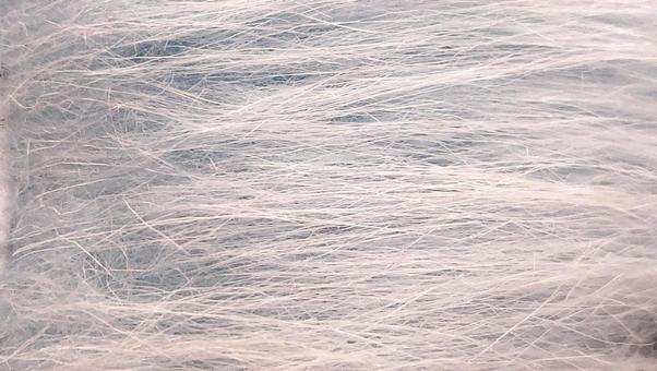 水色のふわふわファーのアップ写真 ふわふわ,毛並み,ファーの写真素材