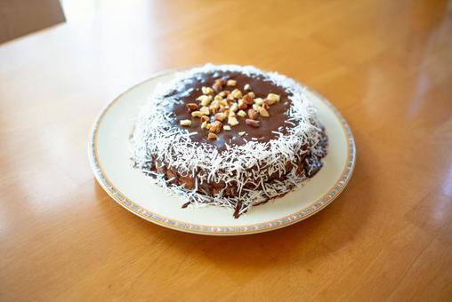 ココナッツとナッツの濃厚チョコケーキ ケーキ,チョコレートケーキ,ココナッツの写真素材