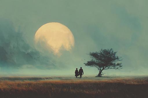 青い夜空と恋人たちの散歩の写真