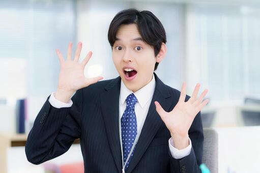 びっくりした顔の顔の若い日本人男性 男性,会社員,ビジネスの写真素材
