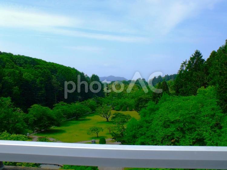 ダムの上から遠くに見える、函館山 ダム,高所,函館山の写真素材