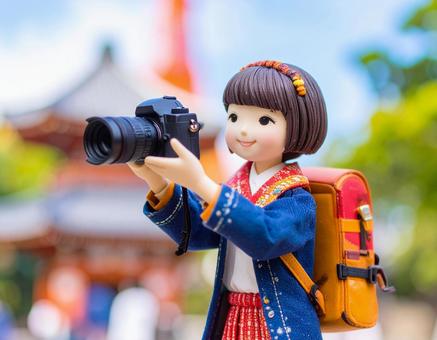 秋を旅する人形 秋を旅する人形の写真