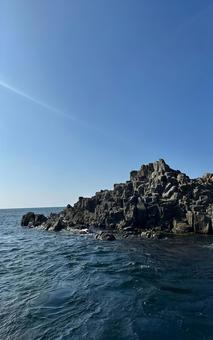 青空と岩が織りなす東尋坊の絶景 青空と岩が織りなす東尋坊の絶景 東尋坊,福井県,絶景スポットの写真素材