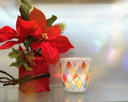 ポインセチアとアロマキャンドル クリスマス,クリスマスツリー,ポインセチアの写真素材