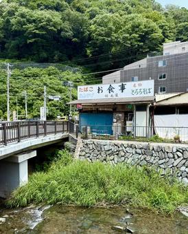 高尾山麓の町並み　2025年夏 田園,駅,雲の写真素材