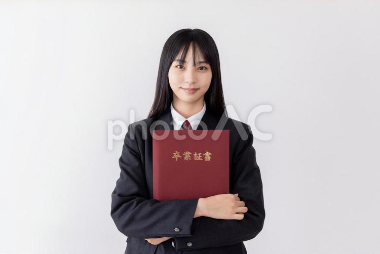 卒業式　女子高生　サクラサク 女性,女子高生,卒業式の写真素材