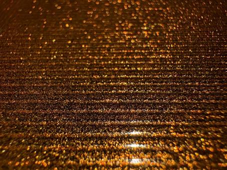 ゴールドの玉ボケ グリッター,ラメ,金色の写真素材