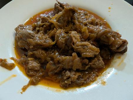 ハツと玉ねぎの料理の写真