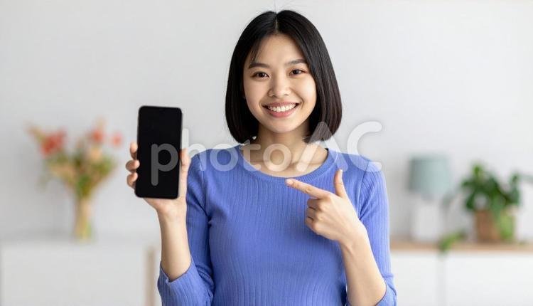 おすすめの指をさす人 女性,春,若者の写真素材