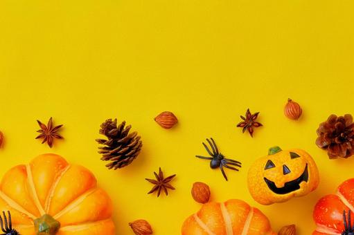 黄色背景の上のハロウィンの飾り 黄色背景の上のハロウィンの飾り ハロウィン,背景,かぼちゃの写真素材