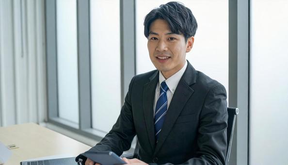 営業するビジネスマン 営業するビジネスマンの写真