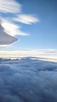 飛行機から見た空 雲海,空,雲の写真素材